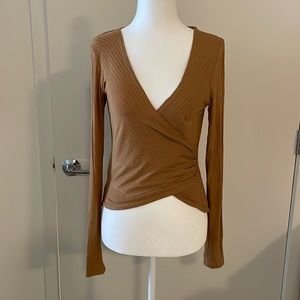 Gold rubbed crossover long sleeved top